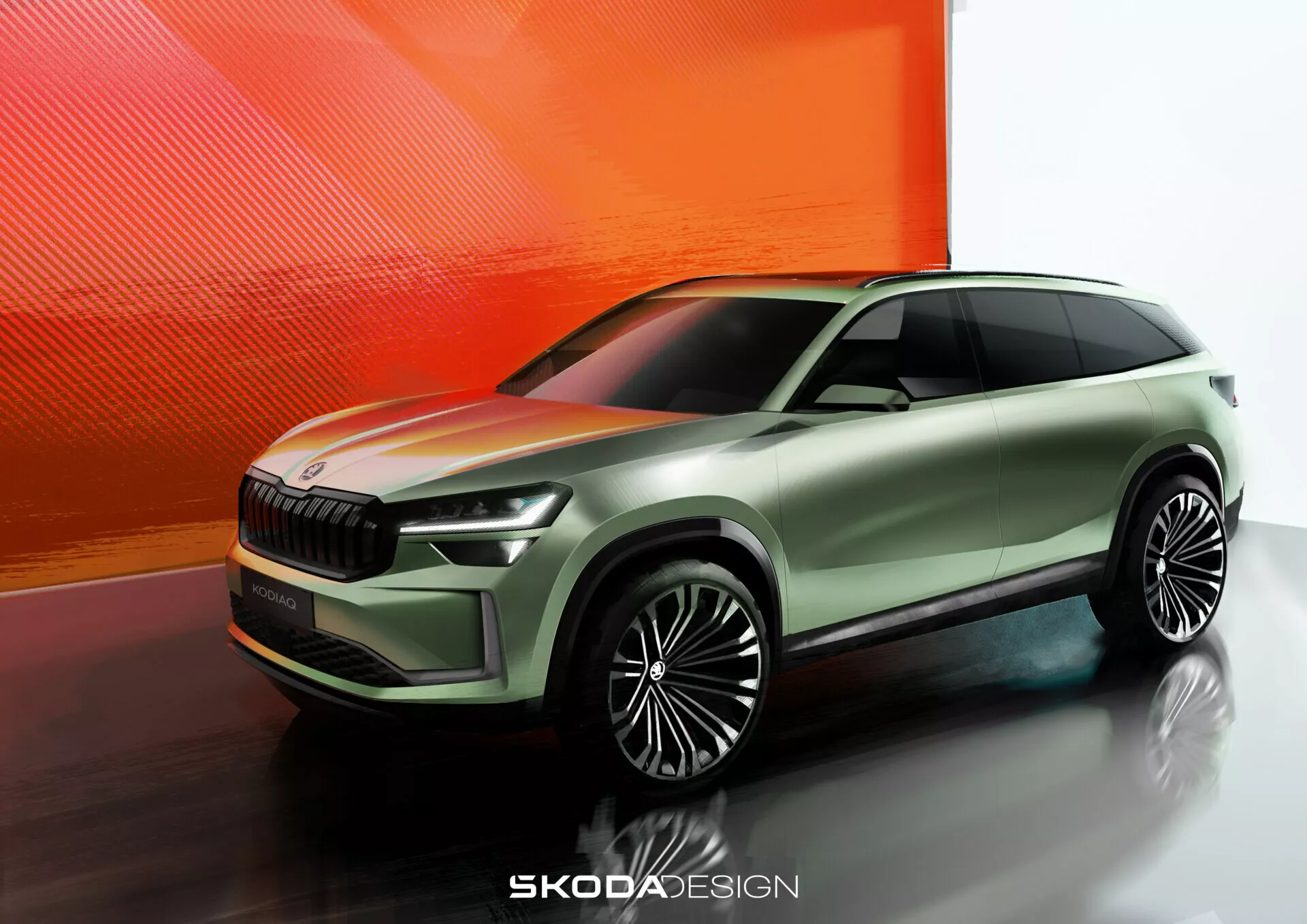 Pohled z nízkého úhlu na tříčtvrteční přední pohled na koncept Škoda, zobrazující dynamickou přední mřížku, elegantní světlomety a sportovní boční profil na pozadí s abstraktním teplým přechodem
