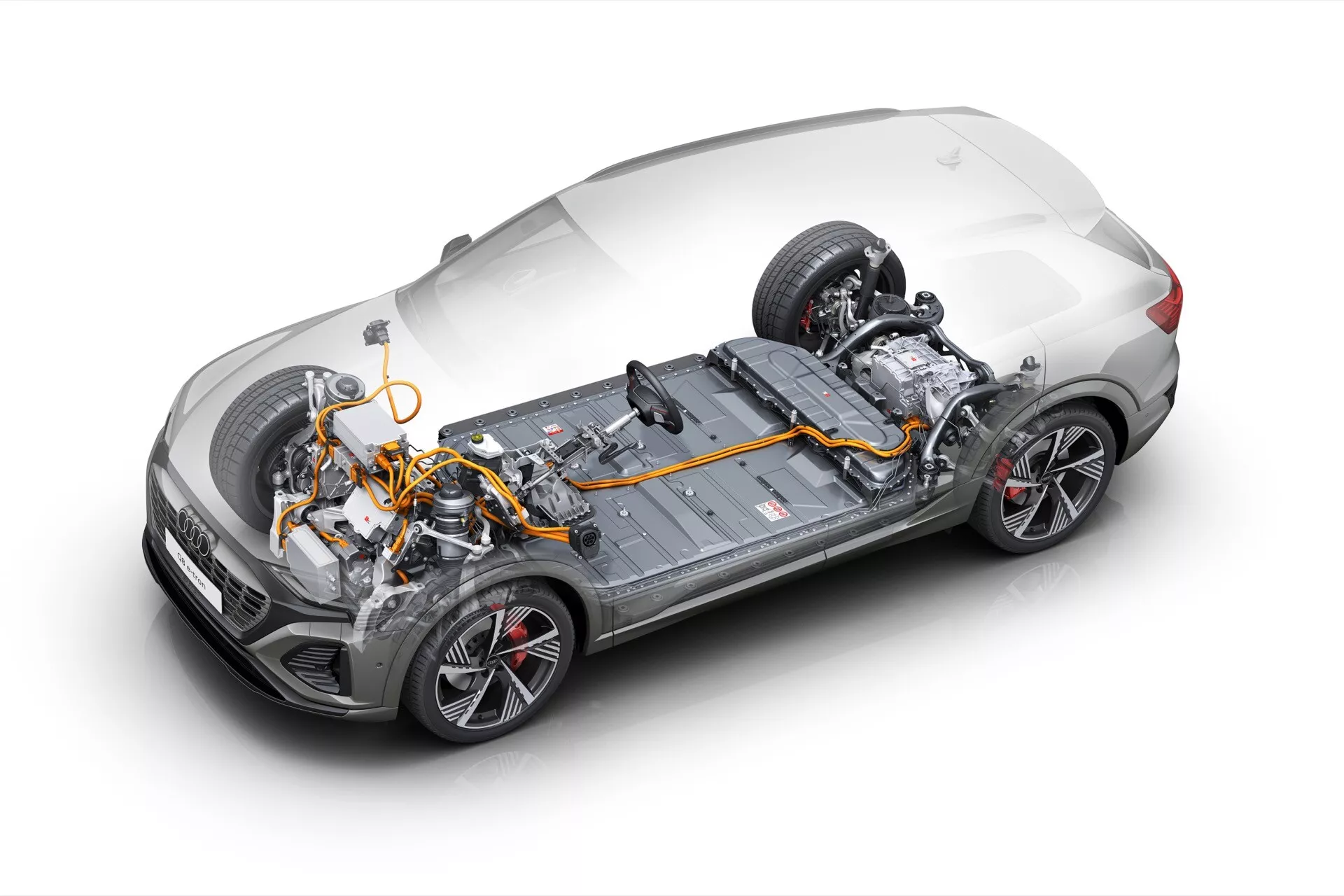 Digitálně vylepšený obrázek Audi Q8 e-tron 2023 zobrazující poloprůhledný pohled ukazující elektrický pohon a vnitřní komponenty z vysokého úhlu přední pravé strany