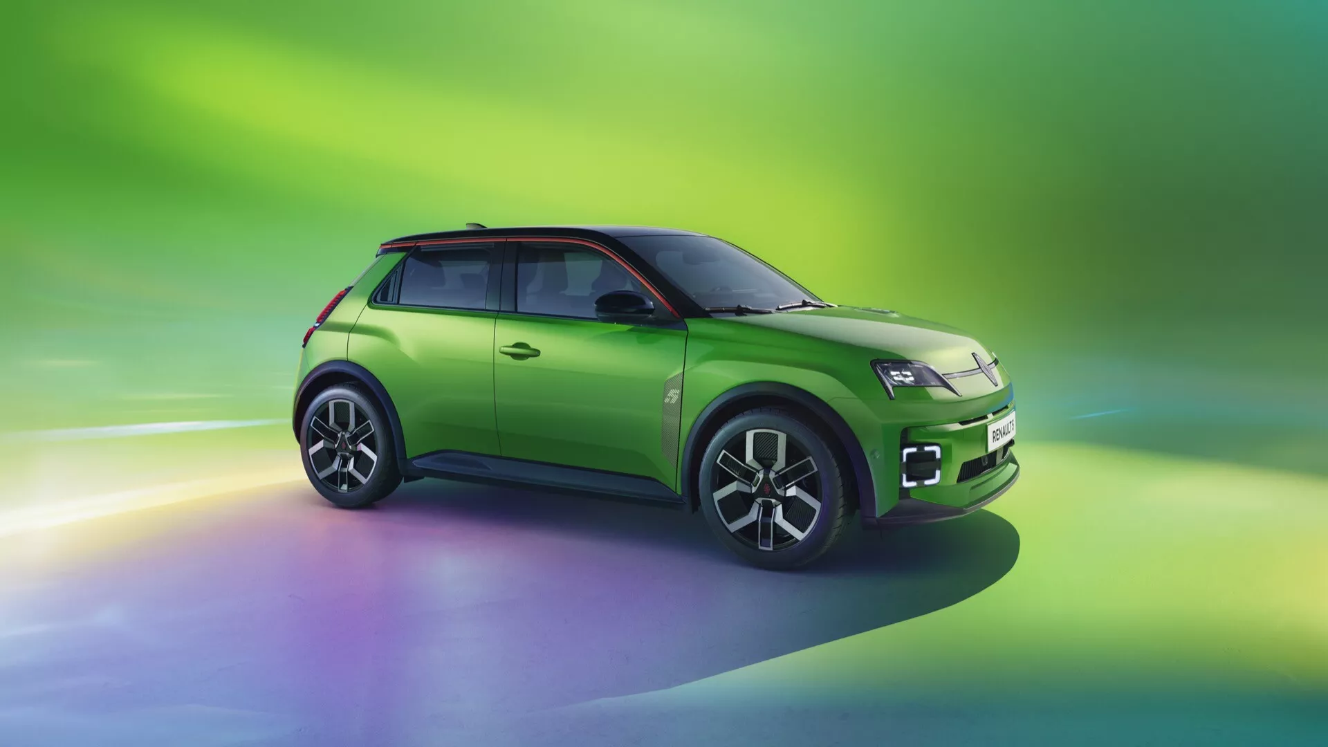 Kompatní SUV Renault R5 2024 ve studiu, pohled zepředu a ze strany ukazuje LED světlomety, pokročilý design kol a potenciální funkce ADAS
